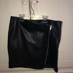 Faux leather skirt with zipper in front.